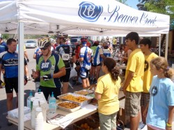 The appreciative children and the riders at the finish line food tent. © SOS Outreach