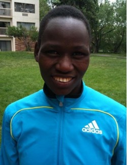 She’s got a great reason to smile—this year’s winner, Emily Chebet. © Take The Magic Step