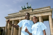 Salina Kosgei and Gete Wami (right) at the Brandenburg Gate in Berlin. © Victah Sailer