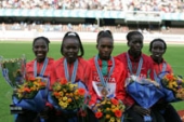 Kenya's marathon women's team appears with different clothing at the victory ceremony.