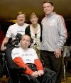 Uta, Dick and Rick Hoyt, and Jim Boyle, John Hancock Insurance Group President, the evening before the Boston Marathon 2008. © Courtesy of Team Hoyt