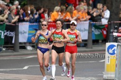 Eventual winner, Irina Mikitenko, pushes the pace with Mara Yamauchi and Zhou Chunxiu. © www.photorun.net