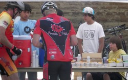 Children welcome the cyclists with refreshments at the aid station in Eagle. © Take The Magic Step/Dieter Hogen