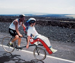 Dick and Rick competing in the Hawaiian Ironman. © Courtesy of Team Hoyt