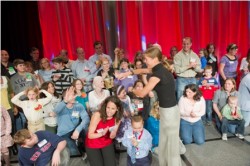 High Fives with the children of the DFMC. © Courtesy of Dana-Farber Cancer Institute (photography by Justin Knight)