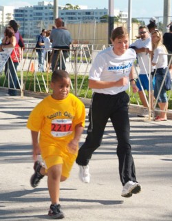 “I love running now!” said Tyler Lewis. © Take The Magic Step®