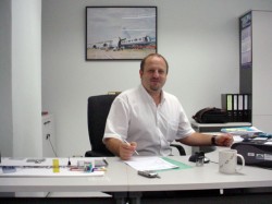 Bernd at his desk in Bangkok, 2005. © All photos are courtesy of Bernd Liebscher