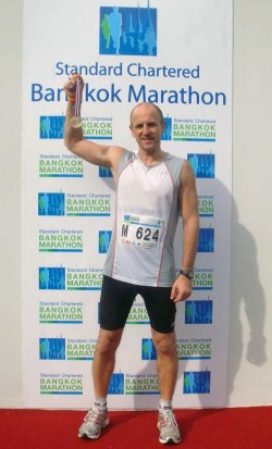 Bernd with his marathon finisher medal.