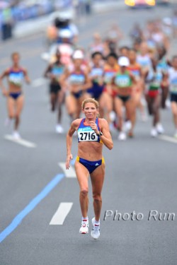 Romanian gold-medal winner Constantina Tomescu-Dita surges ahead of the pack in the Women's Olympic Marathon on August 16th, 2008. © www.PhotoRun.net