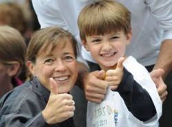 “Thumbs Up” for the Dick Lytie Children’s Run. © Photographer, H. Marc Larson/Reprinted with permission from the Green Bay Press-Gazette 