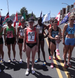 Deena Kastor, seen here before the start with bib number 3, ran a gutsy race, finishing strong to take a third place. © Take The Magic Step®