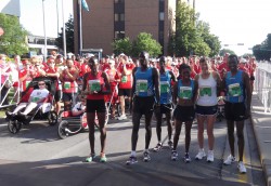 At the Starting Line from the left: Risper Gesabwa, Lani Rutto, Allan Kiprono, Jelliah Tinega, Uta, and John Korir. © Take The Magic Step®