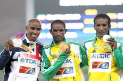 Left to right: Mo Farah, Ibrahim Jeilan, and Imane Merga. © www.photorun.net