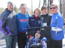 Michael Reger, Bryan Lyons, Kathy Boyer, Rick Hoyt, Uta, and Dick Hoyt. © Sue Bray