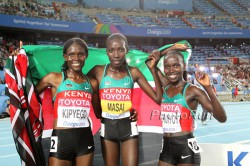 Left to right: Sally Kipyego, Linet Masai, and Vivian Cheruiyot. © www.photorun.net