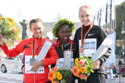 Irina Mikitenko, Florence Kiplagat, and Paula Radcliffe. © www.PhotoRun.net
