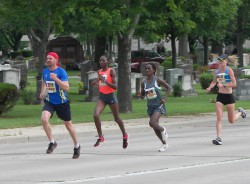 Risper Gesbwa and Joscah Obare on their way to the finish line. © Take The Magic Step