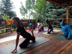 Yoga with my fellow runners from Kenya. © Take The Magic Step