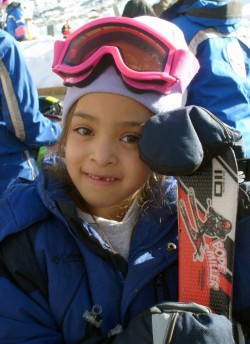 A youngster enjoying the snowy learning experience of SOS.