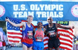 Ryan Hall, Meb Keflezighi, and Abdi Abdirahman smile on their great marathon day. © www.photorun.net